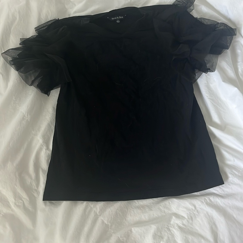 Black tee with fun sleeves